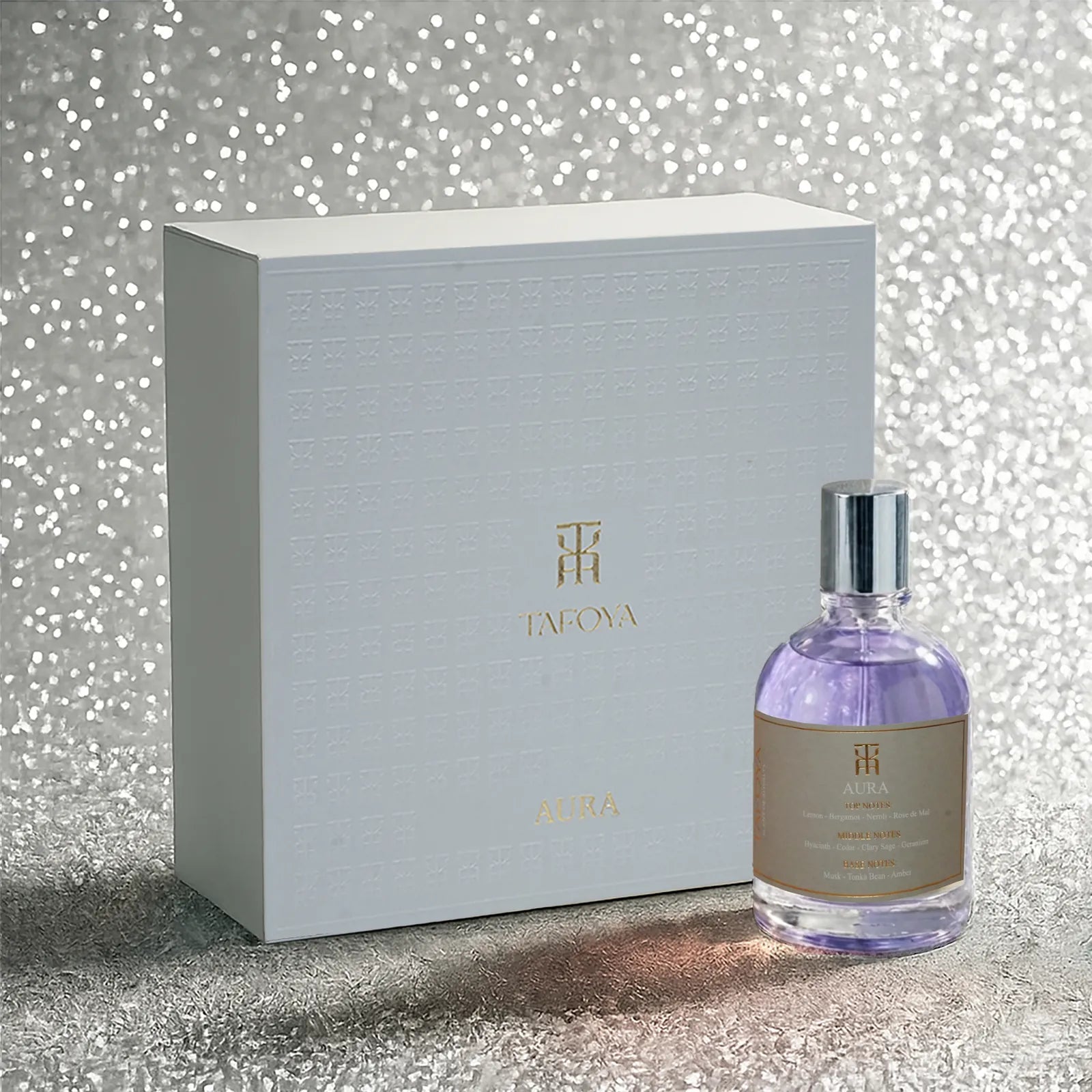 Aura with its colour-matched gift box